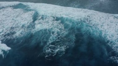 beautiful ocean waves roll passing through shallow water