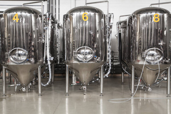 Modern brewery with stainless steel tanks