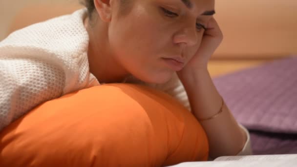 Girl Reading Book Lying Bed — Stock Video