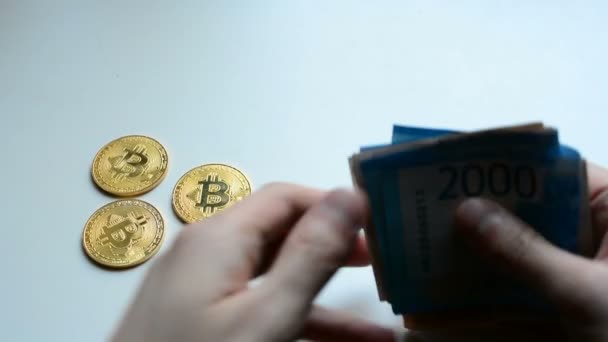 Le choix entre Bitcoin et rouble comptant — Video