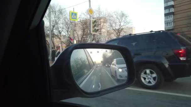 View Rearview Mirror Car Driving Busy City Streets — Stockvideo