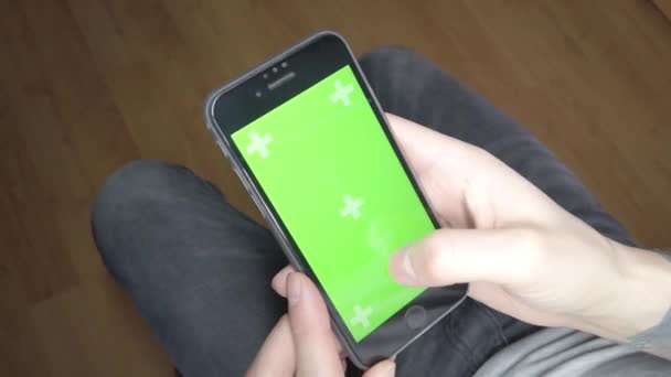 Man Uses Mobile Phone Green Screen Your Phone — ストック動画