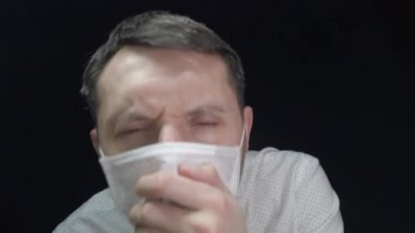 Man in medical mask, protection against coronavirus and various diseases