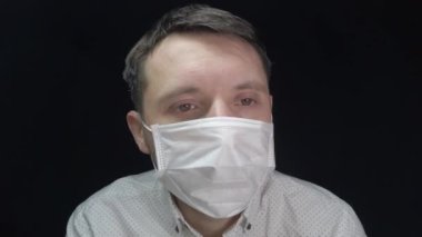 Man in medical mask, protection against coronavirus and various diseases