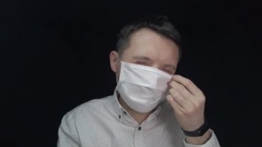 Man in medical mask, protection against coronavirus and various diseases