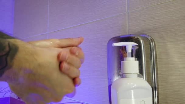 Man Washes His Hands Thoroughly Soap Bathroom Water Flows Tap — Stock Video