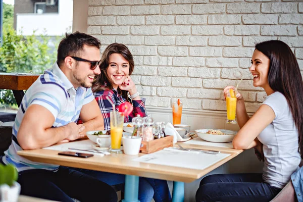 Friends laughing at the lunch — Stock Photo, Image