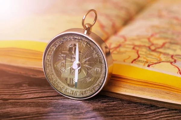 Map with compass and bitcoin. Simple navigation tools to orient in the world. — Stock Photo, Image