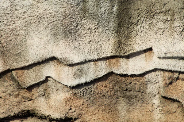 Fragment einer Mauer aus einem Bruchstein — Stockfoto