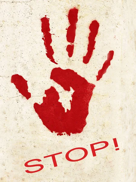 Uma impressão de palma em concreto, um símbolo ou um sinal, a palavra parar — Fotografia de Stock