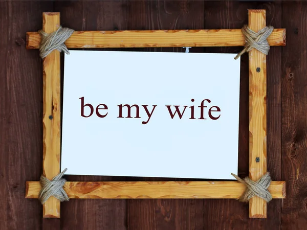木製の背景に木製のフレーム。碑文に私の妻であります。 — ストック写真