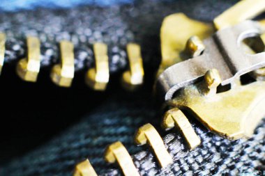 metal fermuar ve kilit kot arka plan üzerinde makro