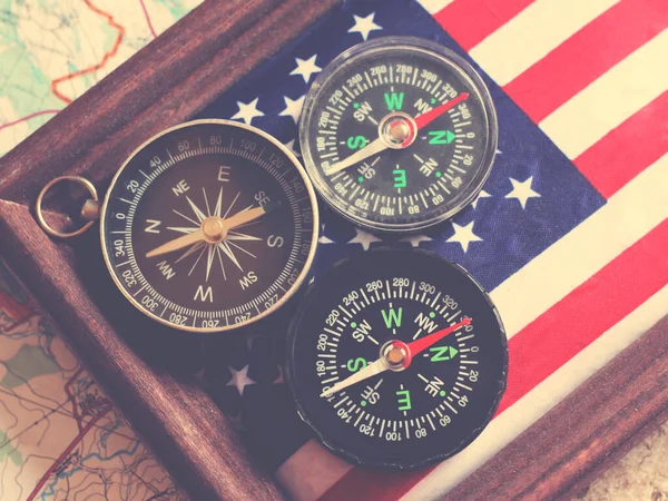 Three Compasses American Flag Wooden Frame Travel Theme — Stock Photo, Image