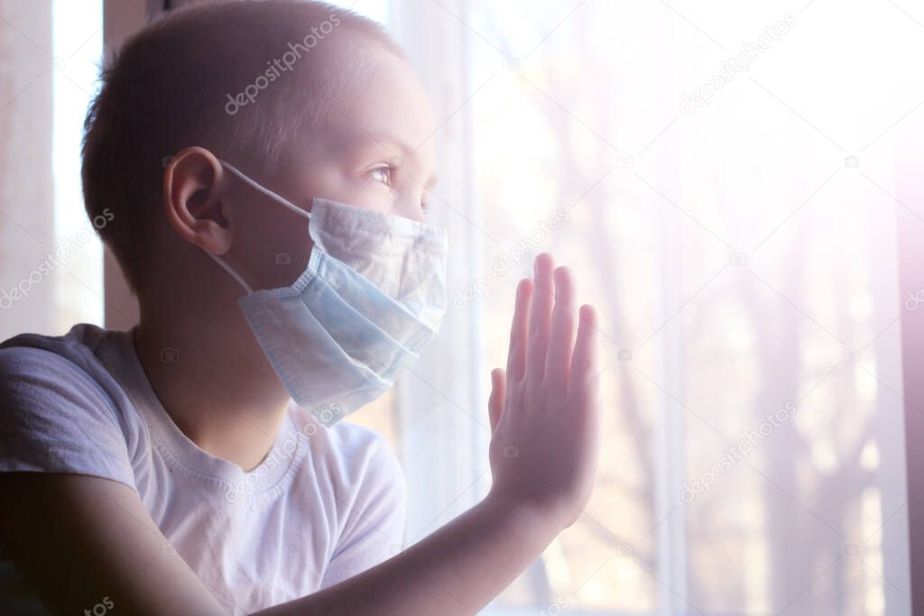 Toddler boy with a medical mask on his face Warning of the dangers of traveling to China and safety measures against coronavirus 2019 nKoV Coronavirus originating in Wuhan, China Close-up portrait