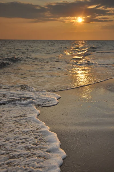 Sunset on the sea during a storm