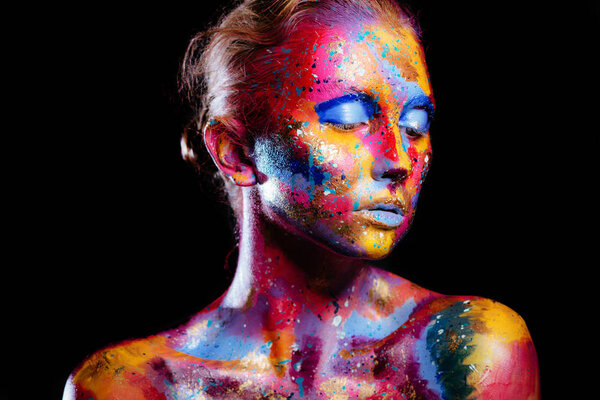 woman with colorful paint brushstroken 