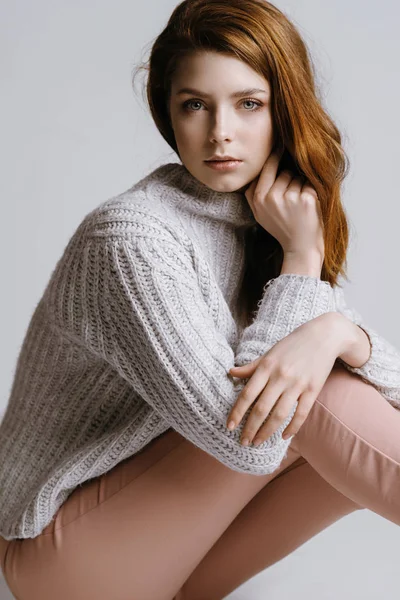 Woman in white sweater — Stock Photo, Image