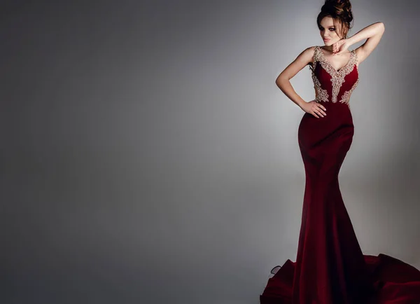 woman in red luxury dress