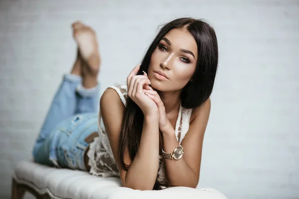 Young beautiful girl in jeans
