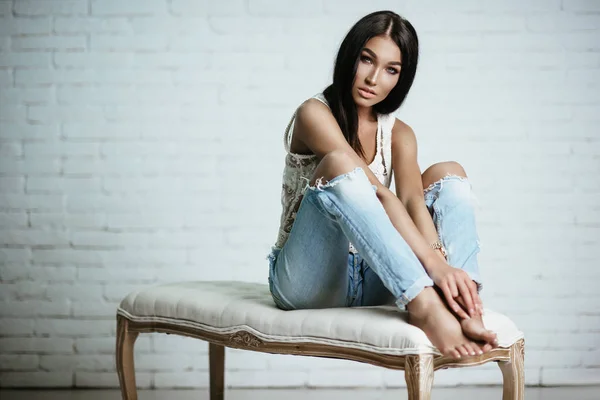 Young beautiful girl in jeans