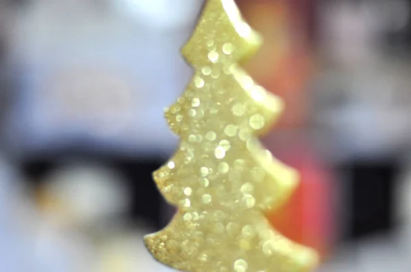 Weihnachten und winter design elemente - goldener weihnachtsbaum glitter verschwimmen hintergrund — Stockfoto