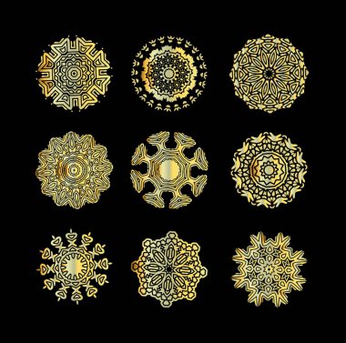 Siyah zemin üzerine altın dairesel süsleme