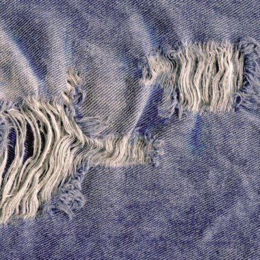 Denim doku yırtık kot pantolon. Yırtık kot kot