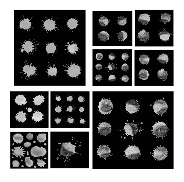 Zestaw z na białym tle czarne plamy atramentu. — Zdjęcie stockowe