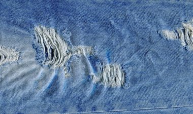 Mavi yırtık kot jeans doku