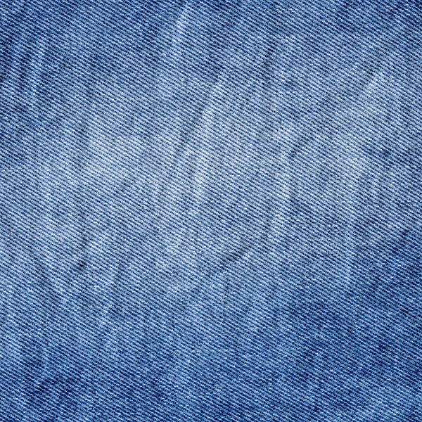 Textura costurada jeans jeans fundo. Tecido de jeans de ganga — Fotografia de Stock