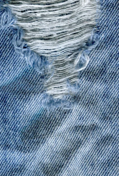 Azul denim jean textura de fondo. Vaqueros rasgados textura de la tela — Foto de Stock