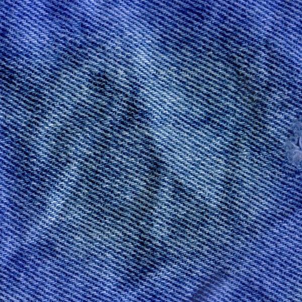 Texture of jeans textile close up. Jeans denim background