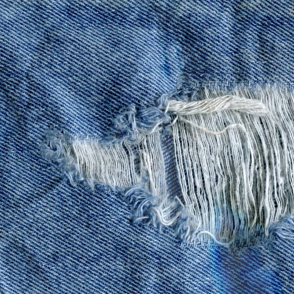 Blue denim jean texture background. Jeans torn fabric texture — Stock Photo, Image