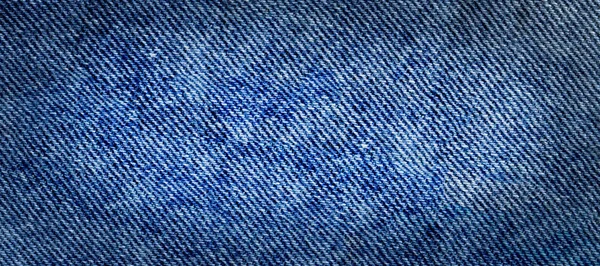 Textur von Jeanstextilien aus nächster Nähe. Jeans Jeans Hintergrund — Stockfoto