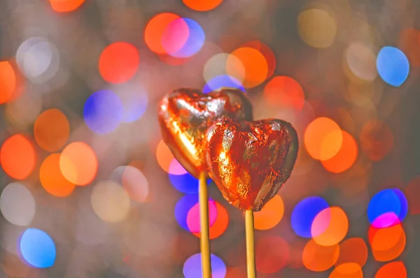 Doces de chocolate em forma de coração. doces corações de chocolate vermelho — Fotografia de Stock