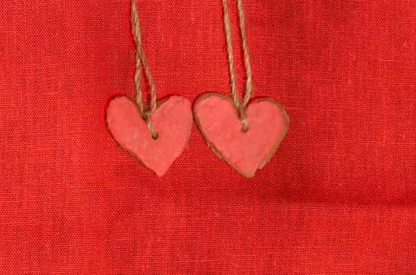 Galletas en forma de corazón con glaseado rojo — Foto de Stock