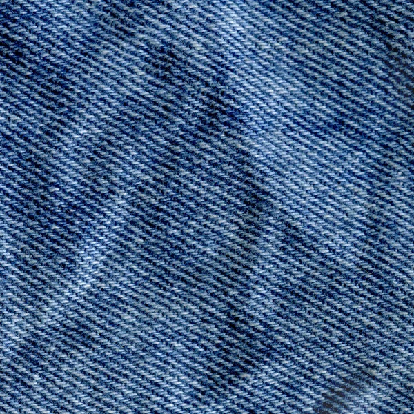 Texture of jeans textile close up. Jeans denim background