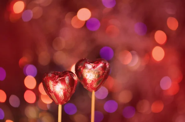 Doces de chocolate em forma de coração. doces corações de chocolate vermelho — Fotografia de Stock