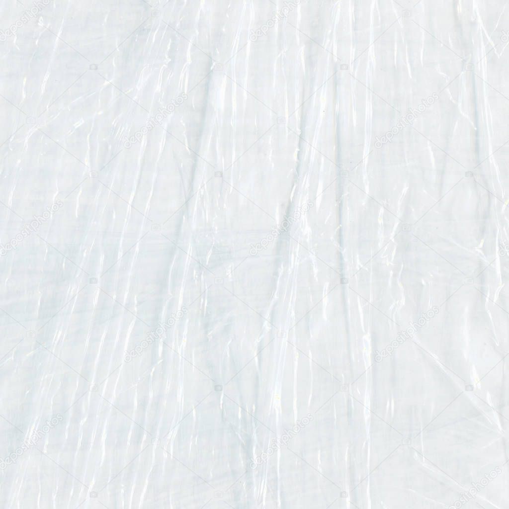 White crumpled cellophane. Polyethylene white texture