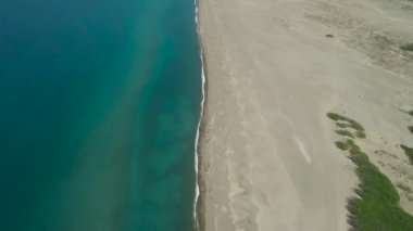 Paoay Sand Dunes, Ilocos Norte, Philippines. Large island with a wide beach.