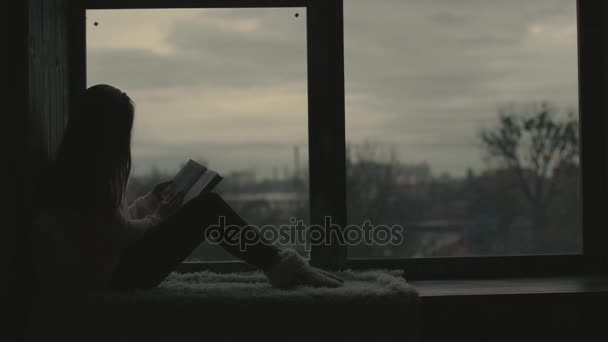 Blond model girl read a book turning pages — Αρχείο Βίντεο