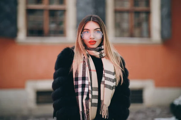 Happy woman laughing outside on street looking at camera stylish girl having fun joyful playful good mood perfect smile cheerful emotional face portrait