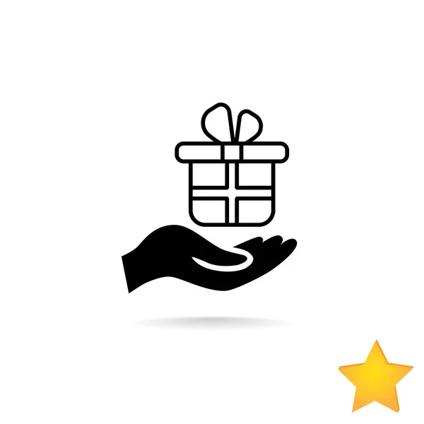 Gift box i hand ikon — Stock vektor