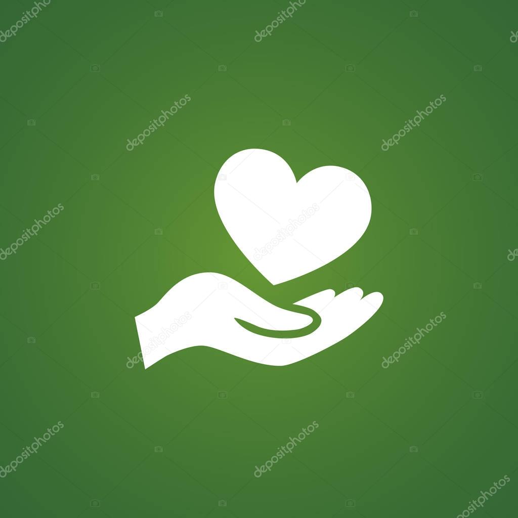 Heart in hand icon