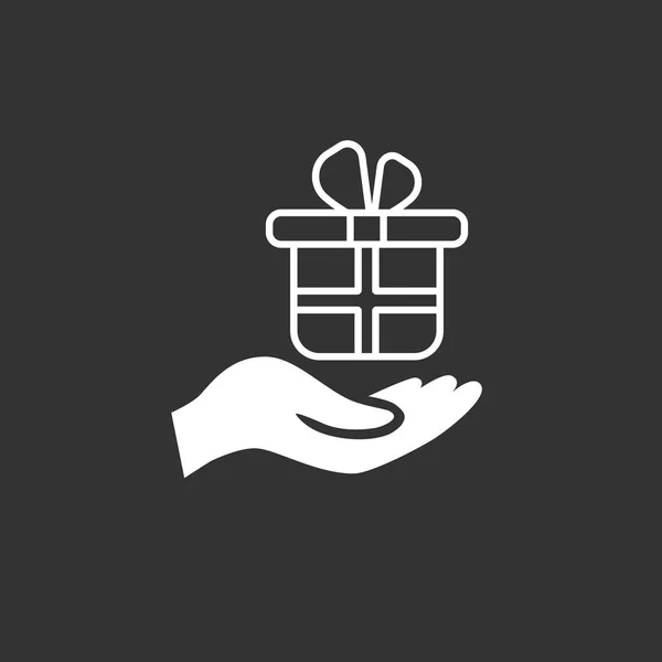 Caja de regalo en la mano — Vector de stock