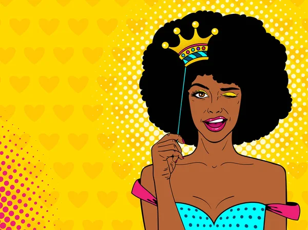 Pop art face. Young sexy african american woman holding funny paper crown on stick, smiling and winking on hearts background. Vector illustration in retro comic style. Holiday party invitation poster. — Stock Vector