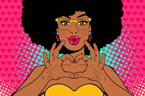 Wow faccia pop art. Sexy giovane donna afro americana con le labbra in forma di bacio e acconciatura afro in occhiali mostra amore segno del cuore. Manifesto di invito colorato vettoriale in stile comico retrò pop art — Vettoriale Stock