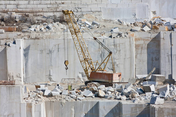 Crawler crane in marble quarry