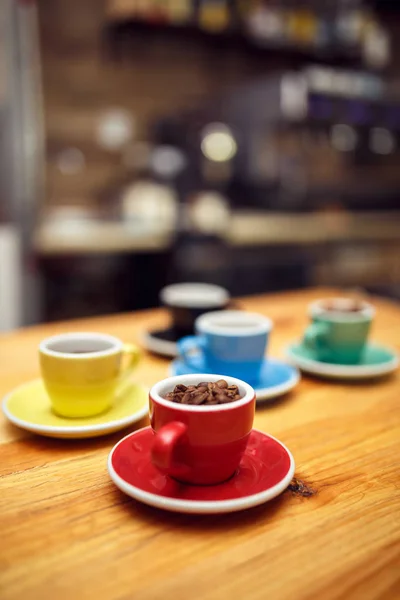 red cup of Grain coffee on table in cafe.