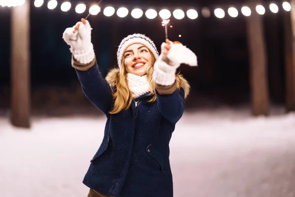 Cheerful Young Woman Holding Sparkler Hand Winter Forest Happy Cute — ストック写真